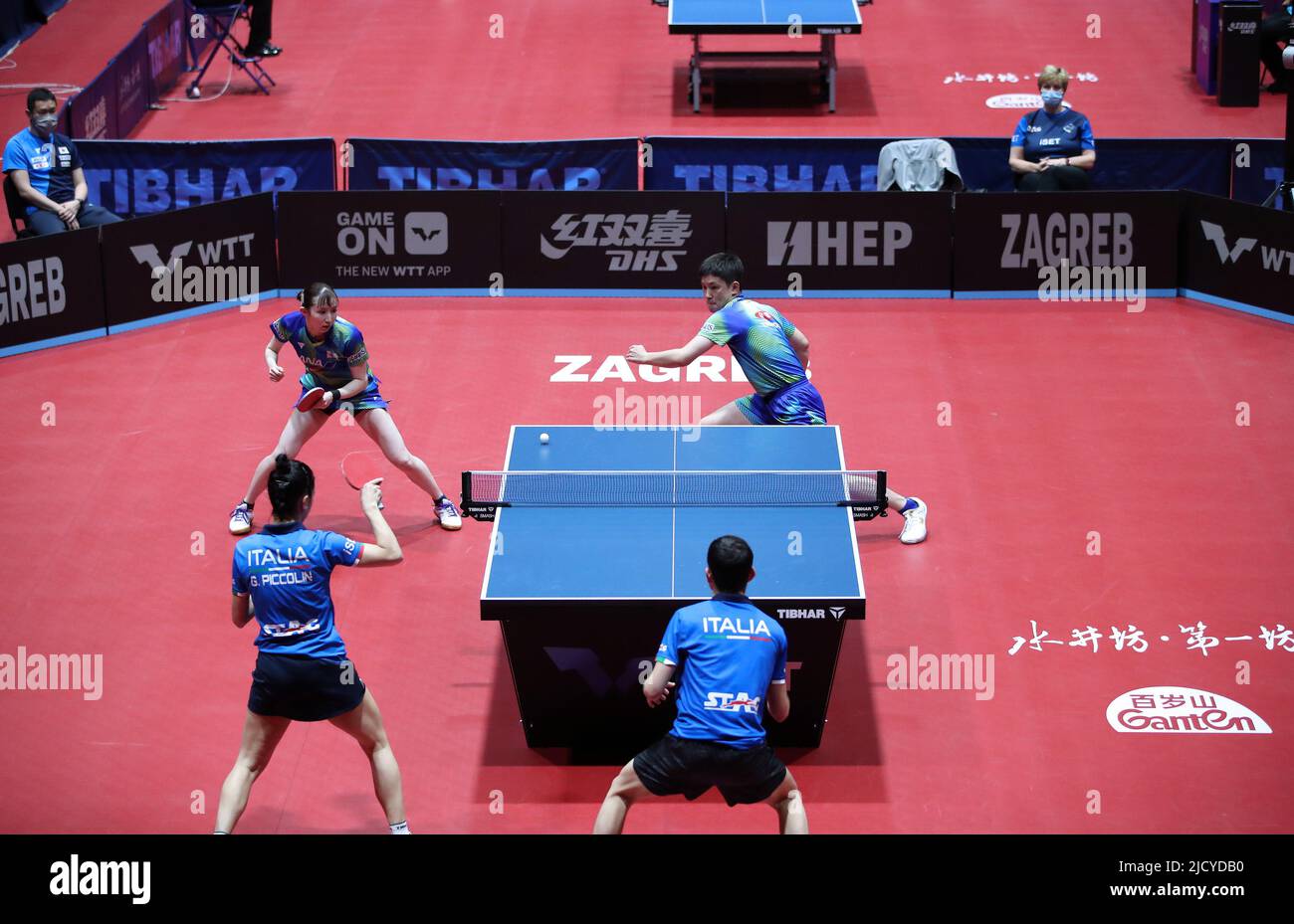 Tomokazu Harimoto and Hina Hayata of Japan in action against Carlo