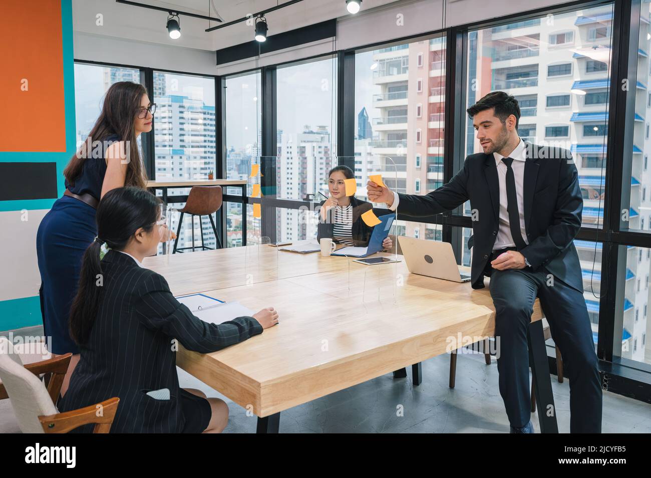 Brainstorming Partition Caucasian businesswoman brainstorming using memo hi-res stock ...