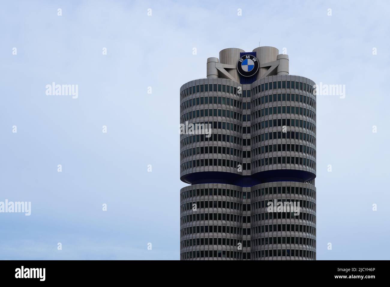 The BMW Tower, the BMW four-cylinder is the main administration building and landmark of the car manufacturer BMW in Munich, Germany, 19.4.22 Stock Photo