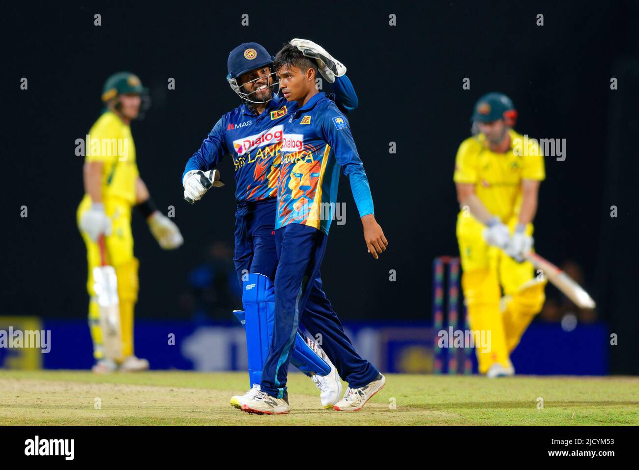 Kandy, Sri Lanka. 16th June 2022. Sri Lanka's Dunith Wellalage celebrates with Kusal Mendis after taking a wicket during the 2nd ODI cricket match between Sri Lanka vs Australia at the Pallekele International Cricket Stadium in Kandy on 16th June, 2022. Viraj Kothalwala/Alamy Live News Stock Photo