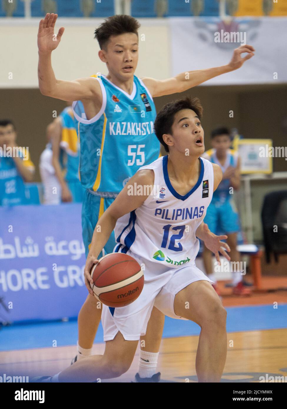 Abat Marat (L) of Kazakhstan Basketball team and Lorenzo Bryan