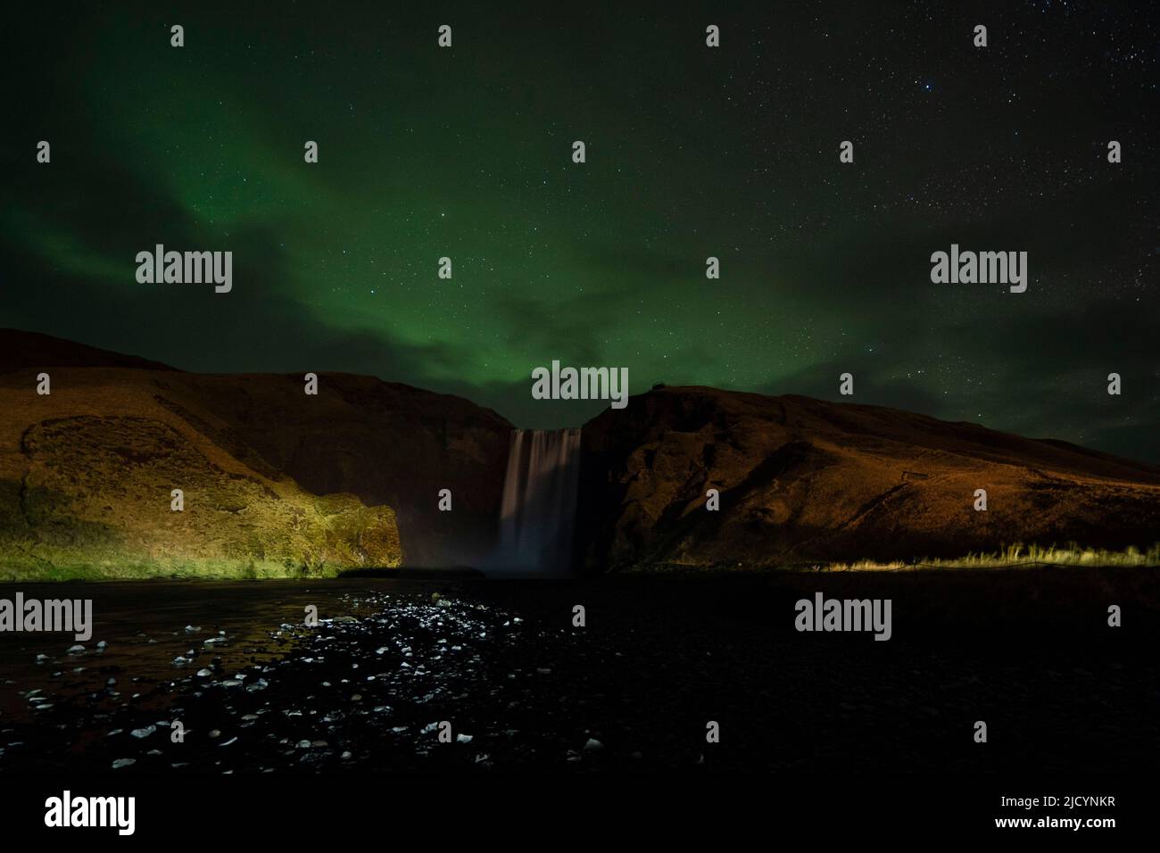 Aurora Borealis, Northern Lights, over Skogafoss waterfall, Iceland. Stock Photo