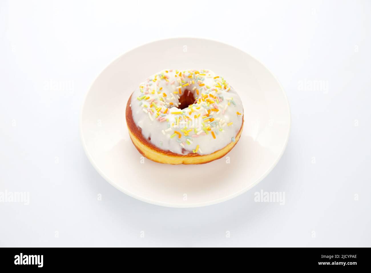 frosted doughnut isolated on white background Stock Photo
