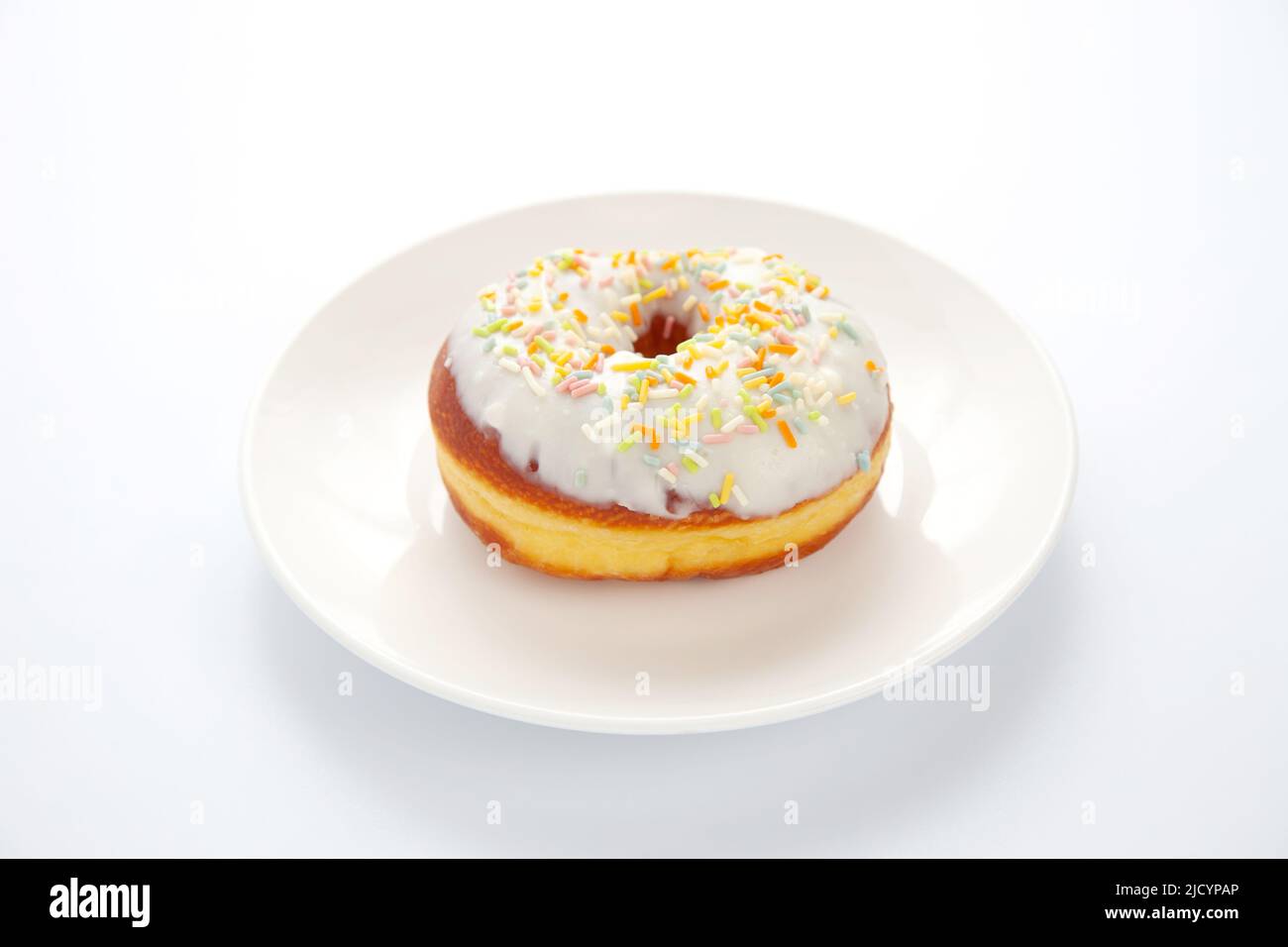 frosted doughnut isolated on white background Stock Photo