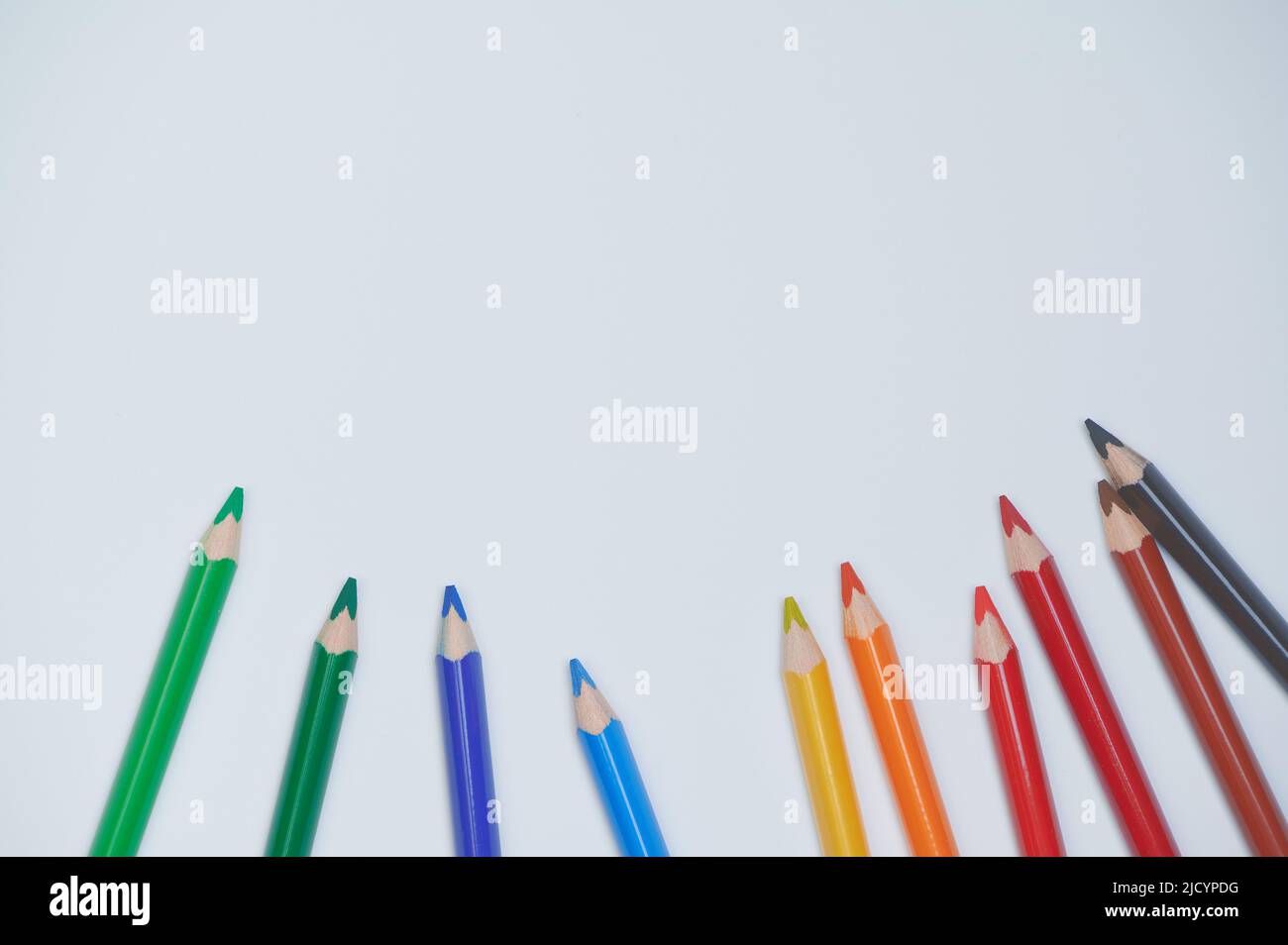 colored pencils on a white background with copy space Stock Photo