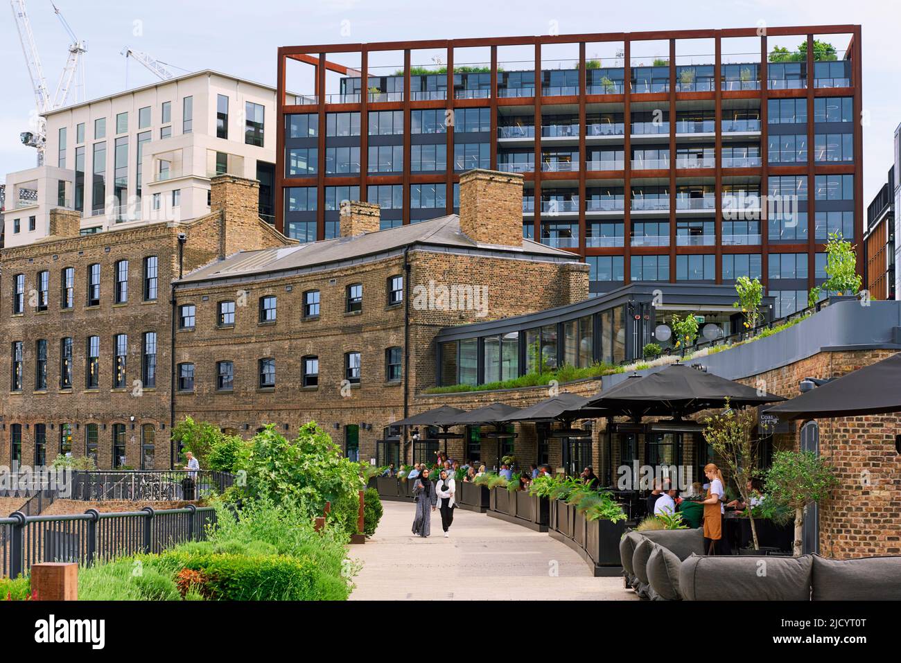 Redeveloped buildings along Bagley Walk at Coal Drops Yard, King's Cross, North London UK Stock Photo