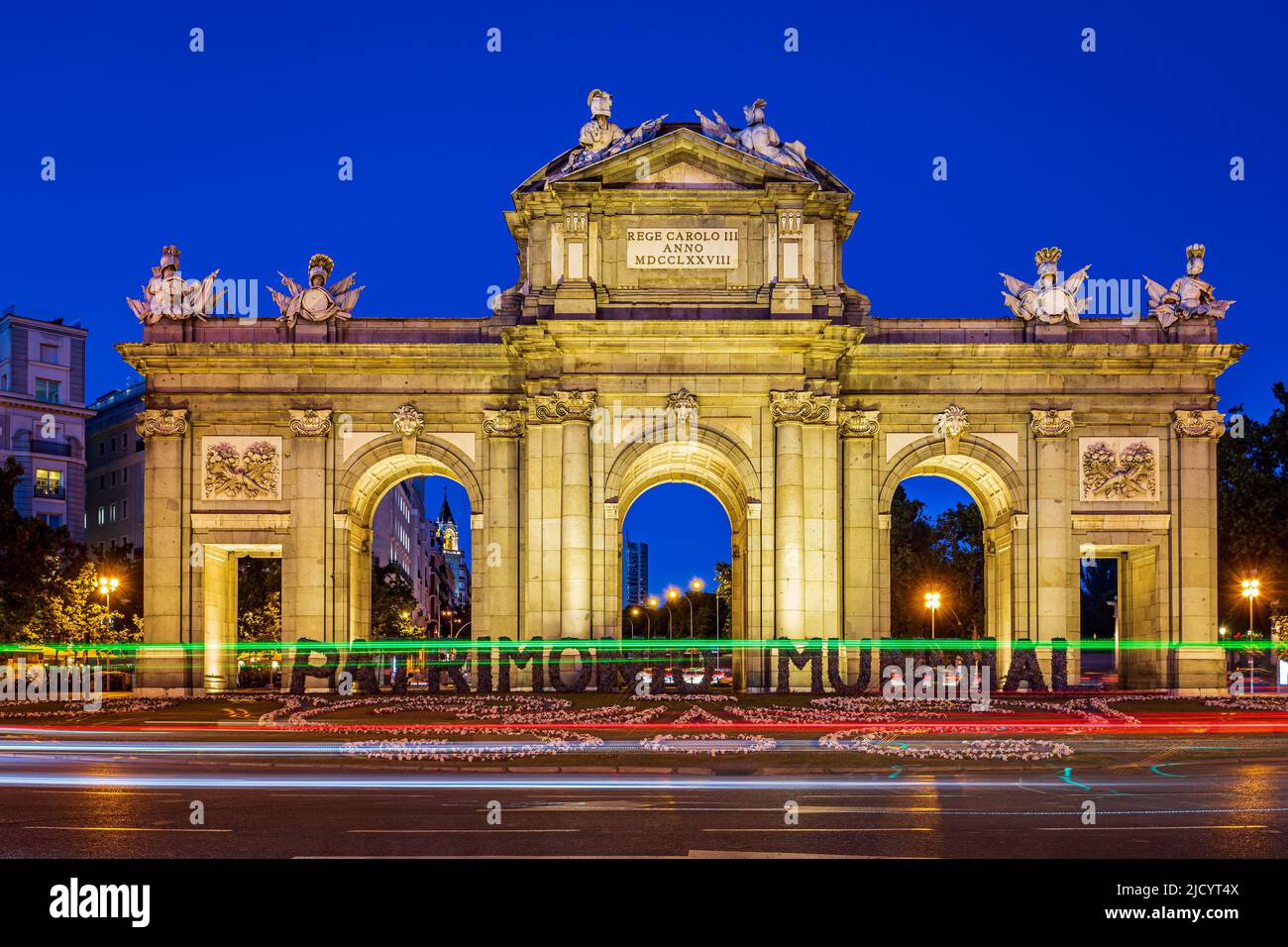 Alcala gate with traffic lights at the blue hour. Photo taken on 31st of May 2022 in Madrid, Spain. Stock Photo