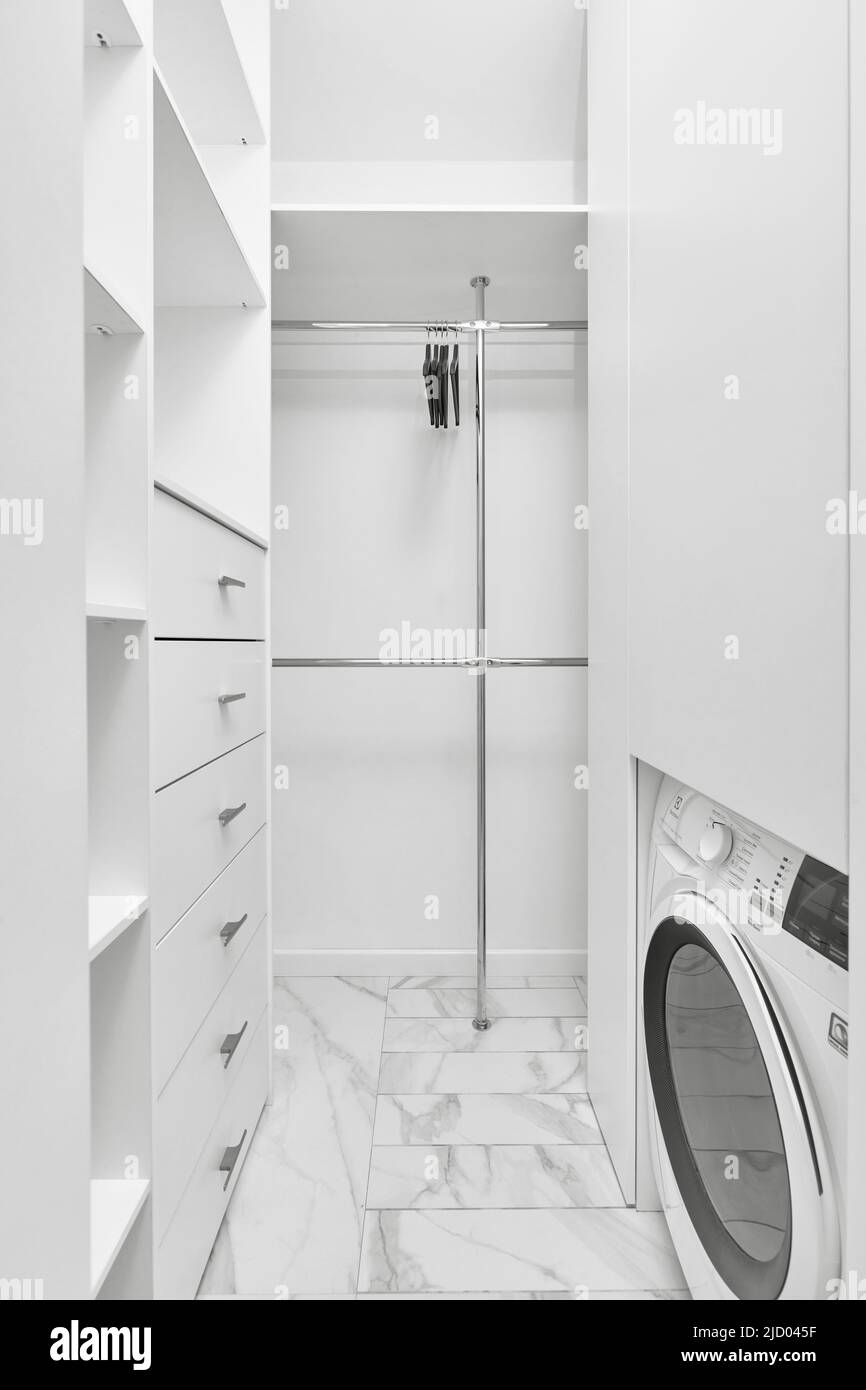 Photo of dressing room and washing machine  Stock Photo