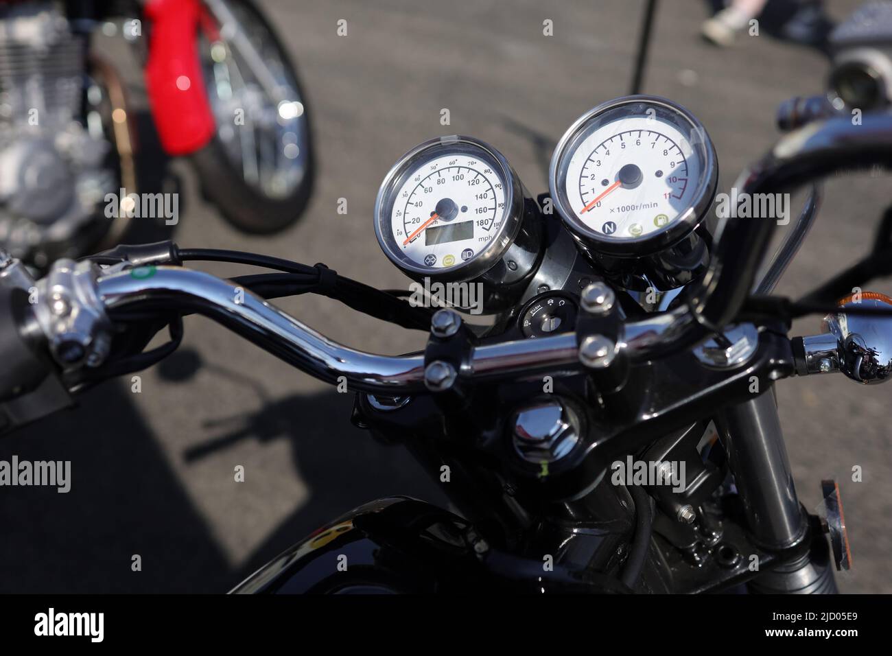 Detail of motorbike and motorcycle - Handlebar and speedometer. Shallow focus and very low depth of field. Stock Photo