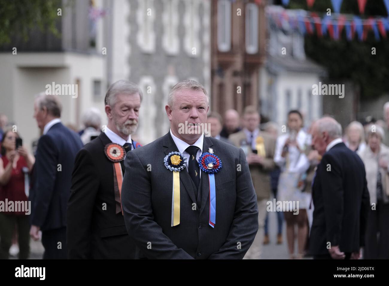 Selkirk, UK. 16th June, 2022. Selkirk, UK., . Selkirk Common Riding 2022. Thursday, The Night afore the Morn. A wreath carried by an emotional faced Ex Standard Bearer Scott Tomlinson is carried and placed at the Fletcher Monument. At 2000hrs during the proceedings the Selkirk Ex-Royal Burgh Standard Bearers form up in a parade to march to the "Fletcher Memorial" and lay a wreath and mark respects for the history and traditions of the Common Riding. ( Credit: Rob Gray/Alamy Live News Stock Photo