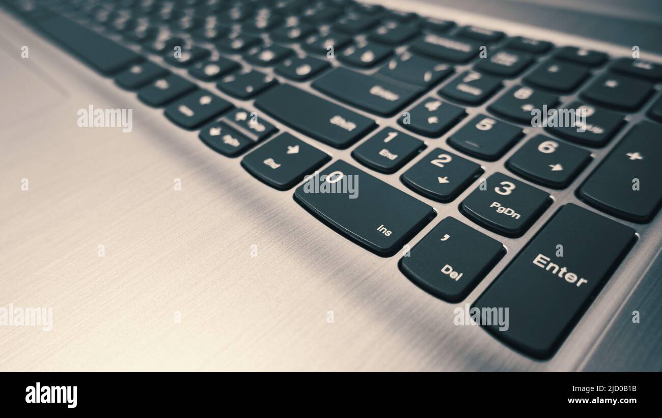 Side view of modern laptop keyboard, selective focus Stock Photo