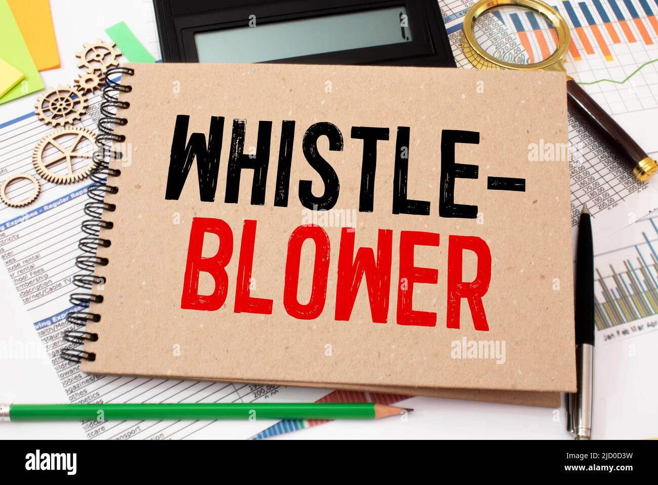 Book about Whistleblower Law isolated on wooden table. Stock Photo