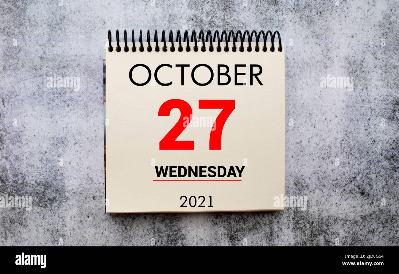 Save the Date written on a calendar - October 27 Stock Photo - Alamy