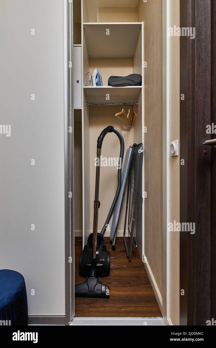 Photo of the closet with a vacuum cleaner inside Stock Photo Alamy