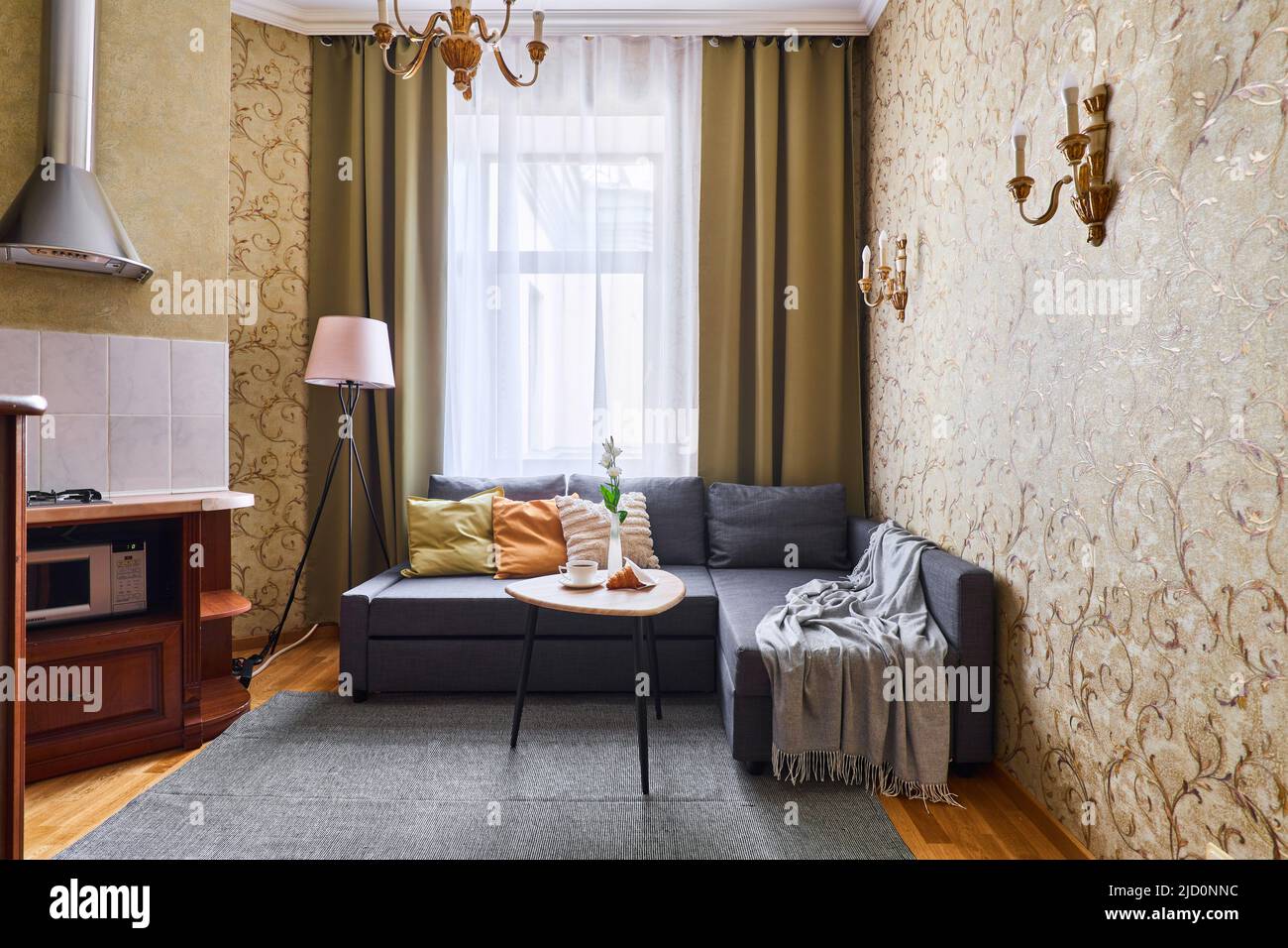 Photo of cozy living room with sofa and food Stock Photo Alamy