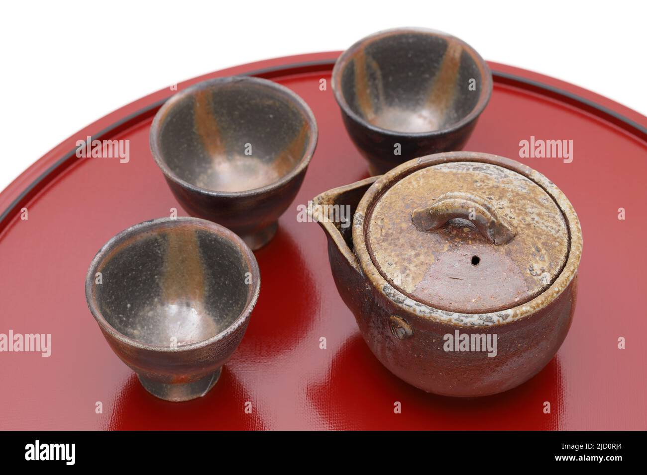 Japanese green tea in a tea set with cup and pot on wooden tray Stock Photo