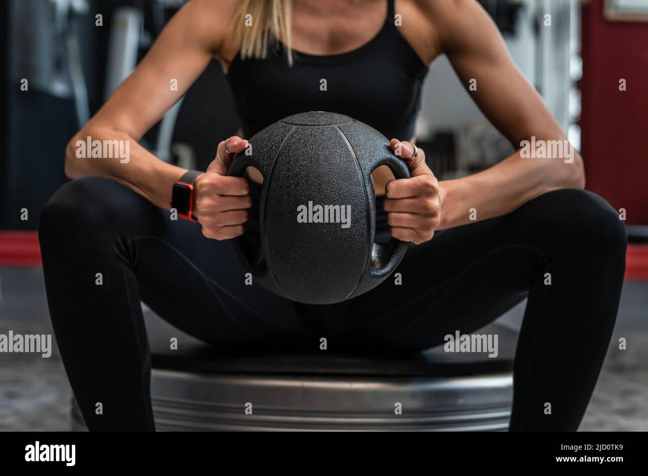 Close up on midsection of unknown caucasian woman female athlete hands ...