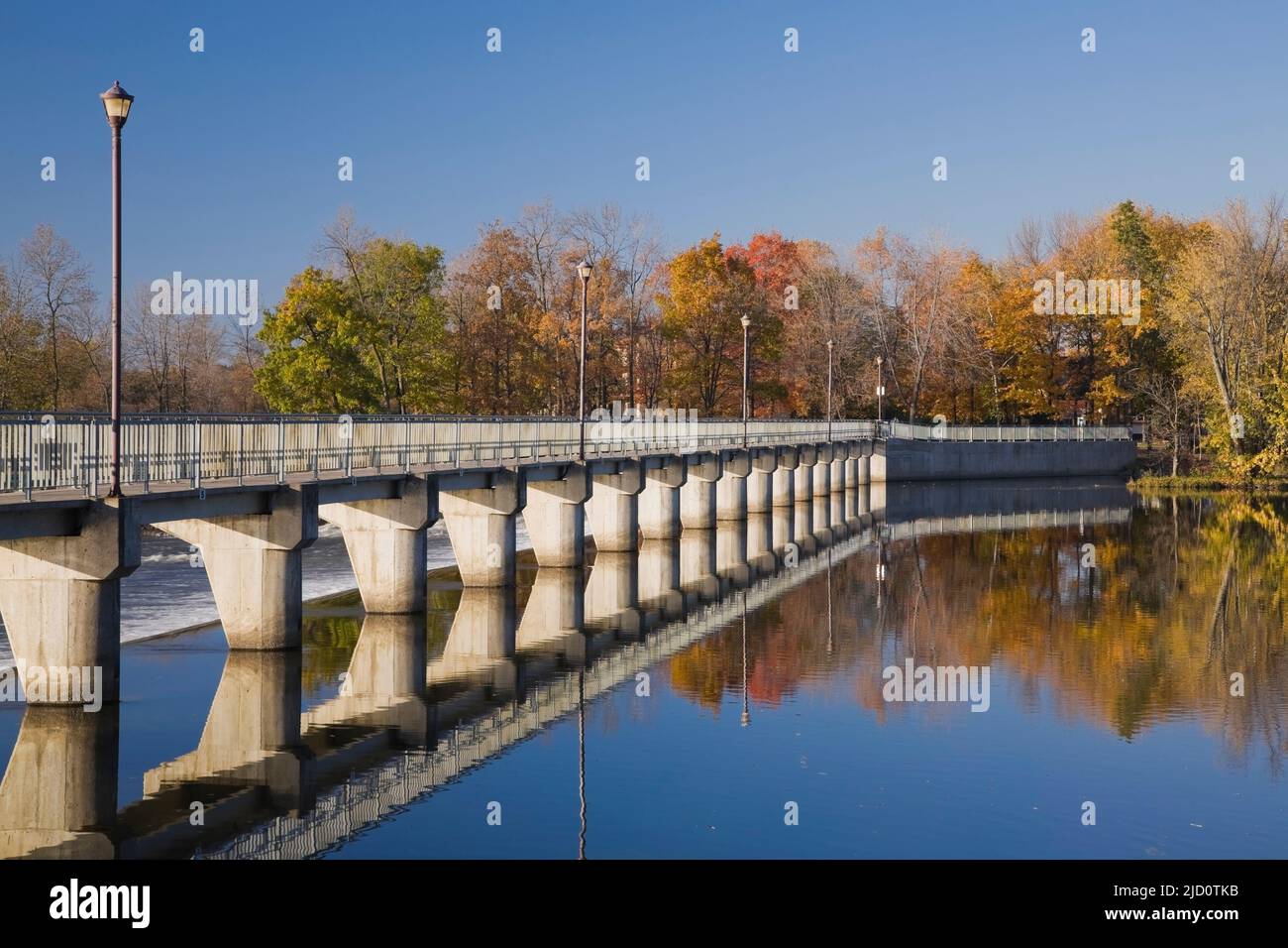 Water flow control dam on Riviere des Mille-Iles in autumn, Old Terrebonne, Lanaudiere, Quebec, Canada. Stock Photo