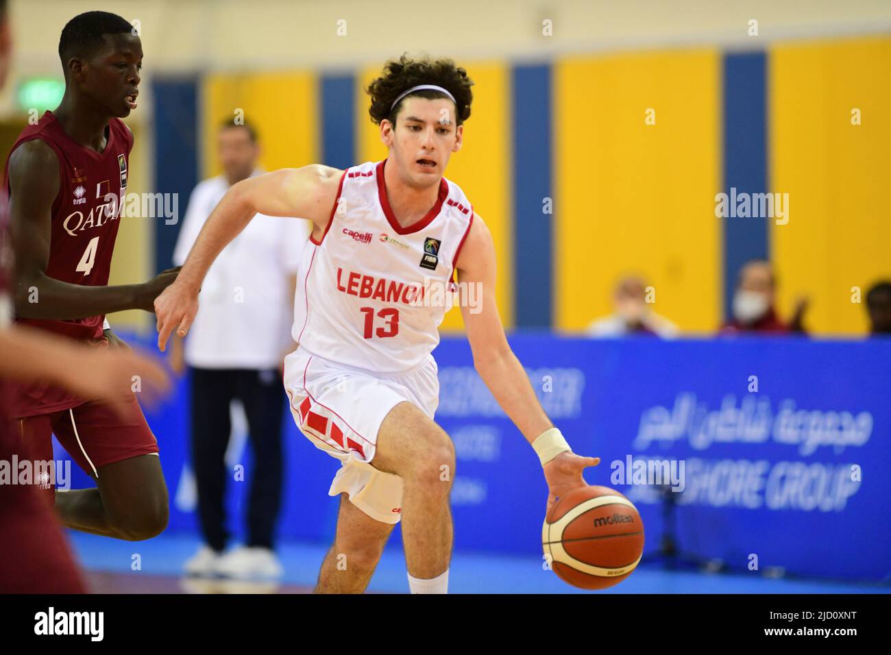 Doha, Qatar. 16th June, 2022. Azzi (R) of Lebanon Basketball