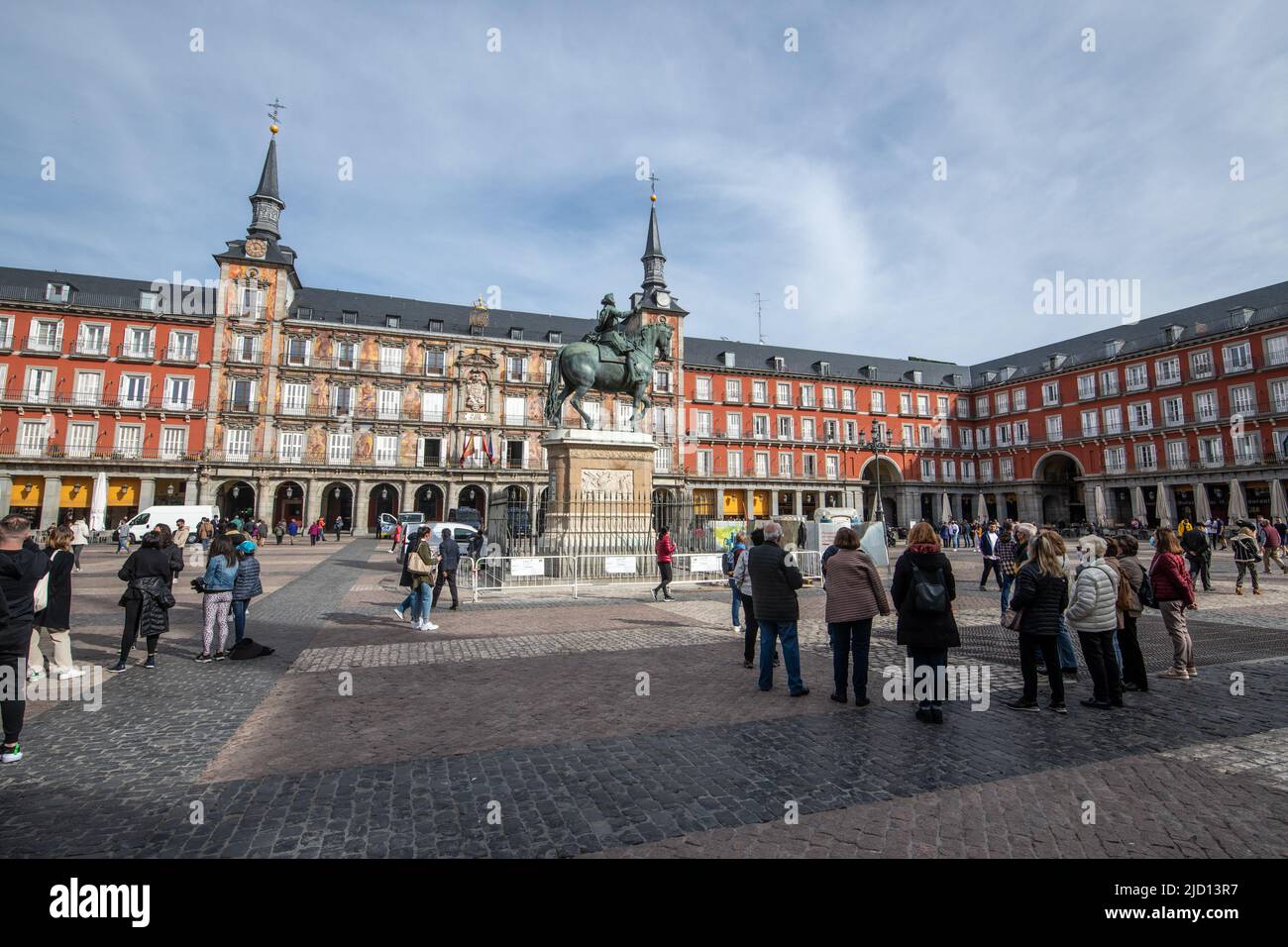 Groups of people sightseeing at the Plaza Mayor, Madrid, Spain Stock Photo