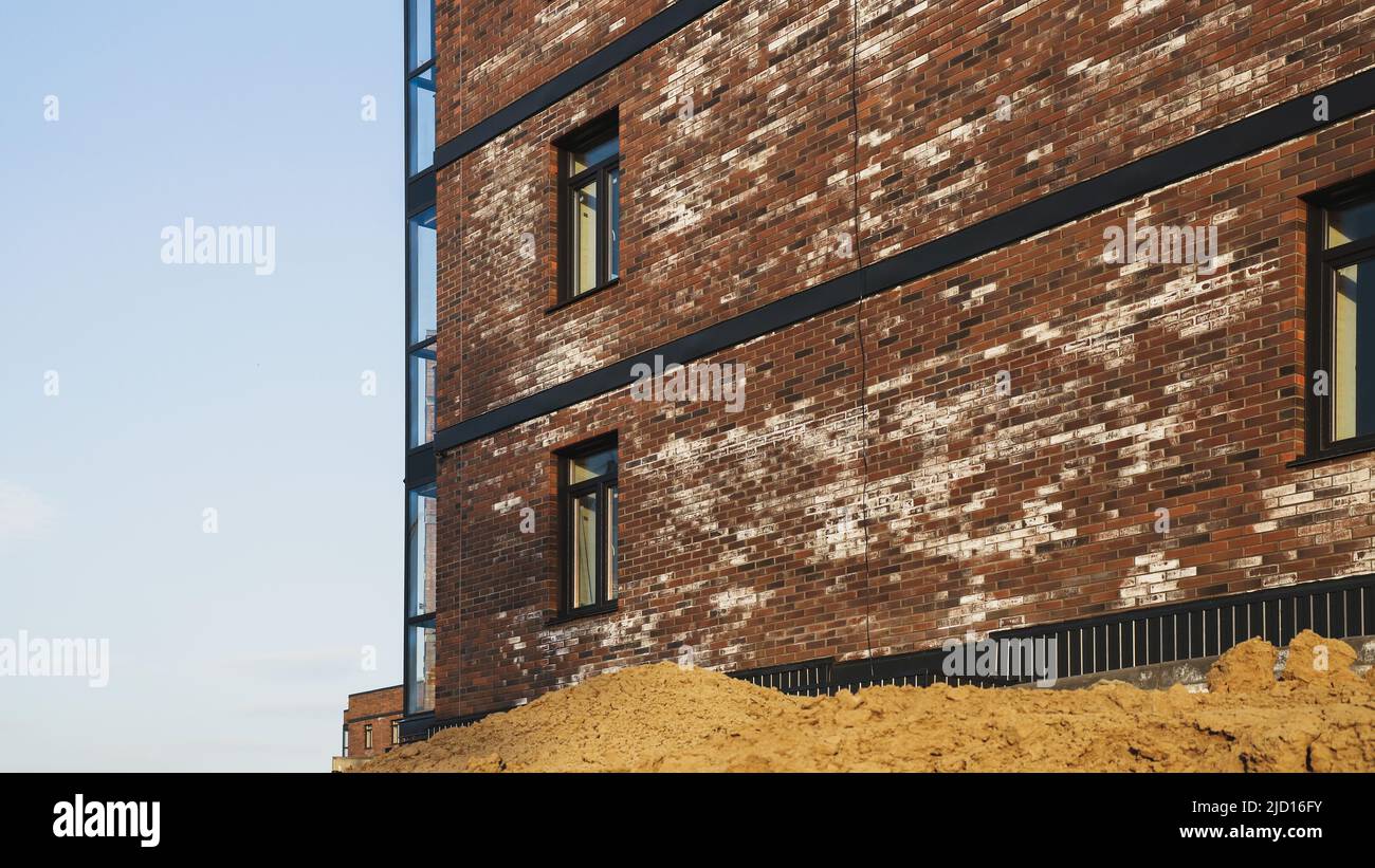 A new brick house stained with white efflorescence, a crystalline of ...