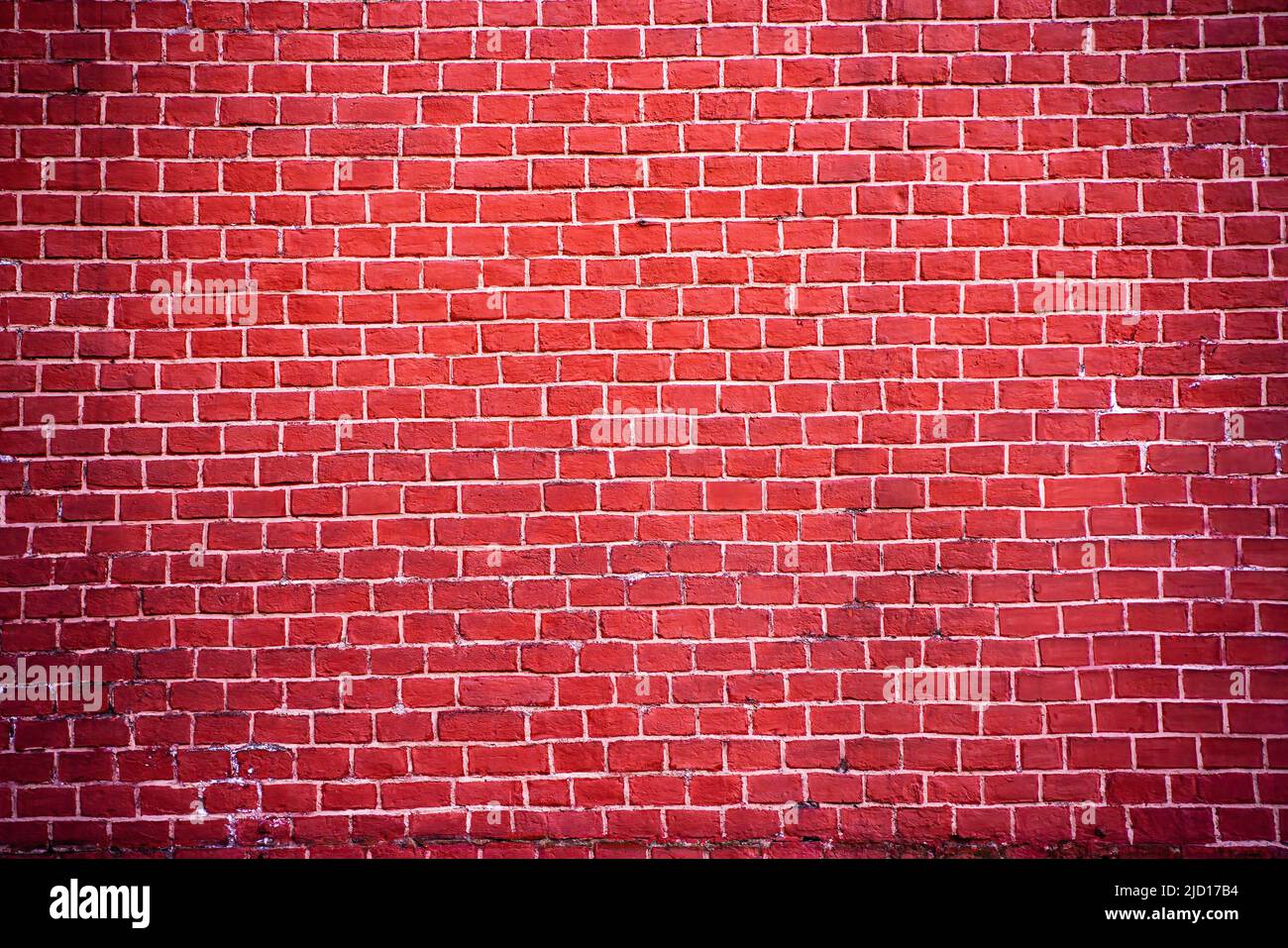 An authentic fragment of the red brick wall of the Moscow Kremlin in Russia. Brick red background for design. High quality photo Stock Photo