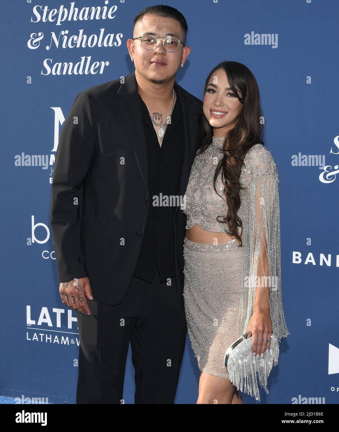 Los Angeles, USA. 16th June, 2022. (LR) Julio UrĂas and Girlfriend at