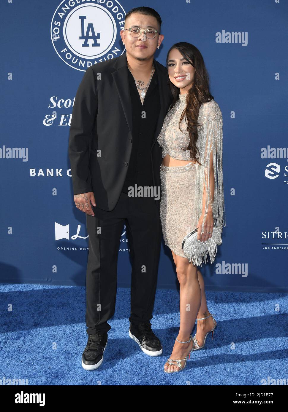 Los Angeles, USA. 16th June, 2022. (L-R) Julio Urías and Girlfriend at the  Los Angeles Dodgers Foundation 6th Annual Blue Diamond Gala held at the  Dodger Stadium in Los Angeles, CA on