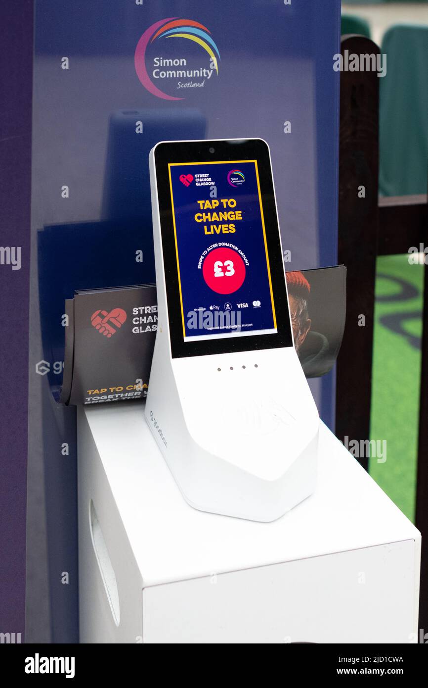 Goodbox payment device for charity Simon Community Scotland at Glasgow train station, Scotland, uk Stock Photo