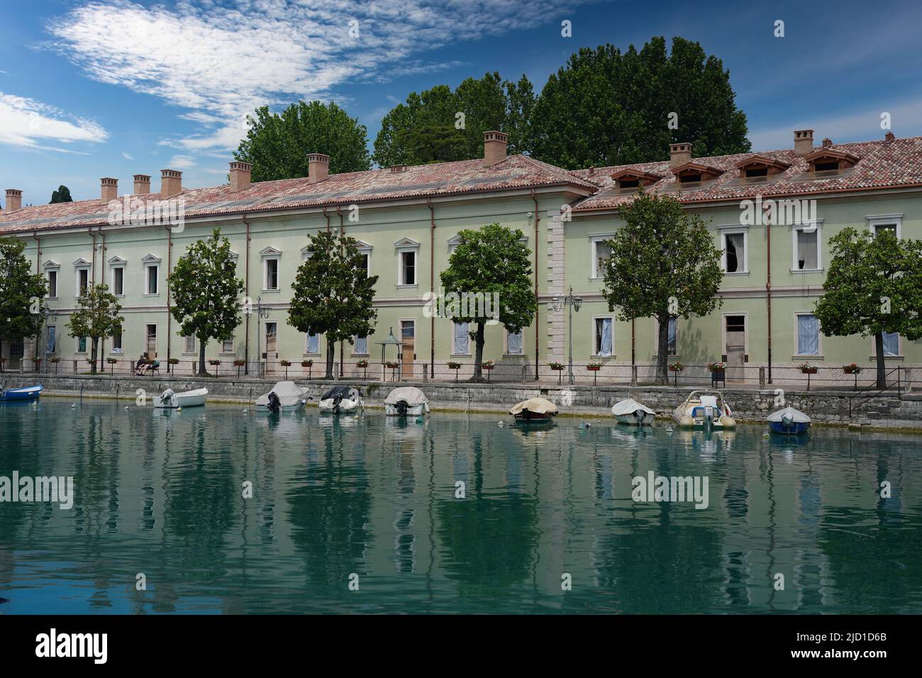 The canal in Peschiera del Garda, Italy on sunny day of May, 05, 2022. Stock Photo