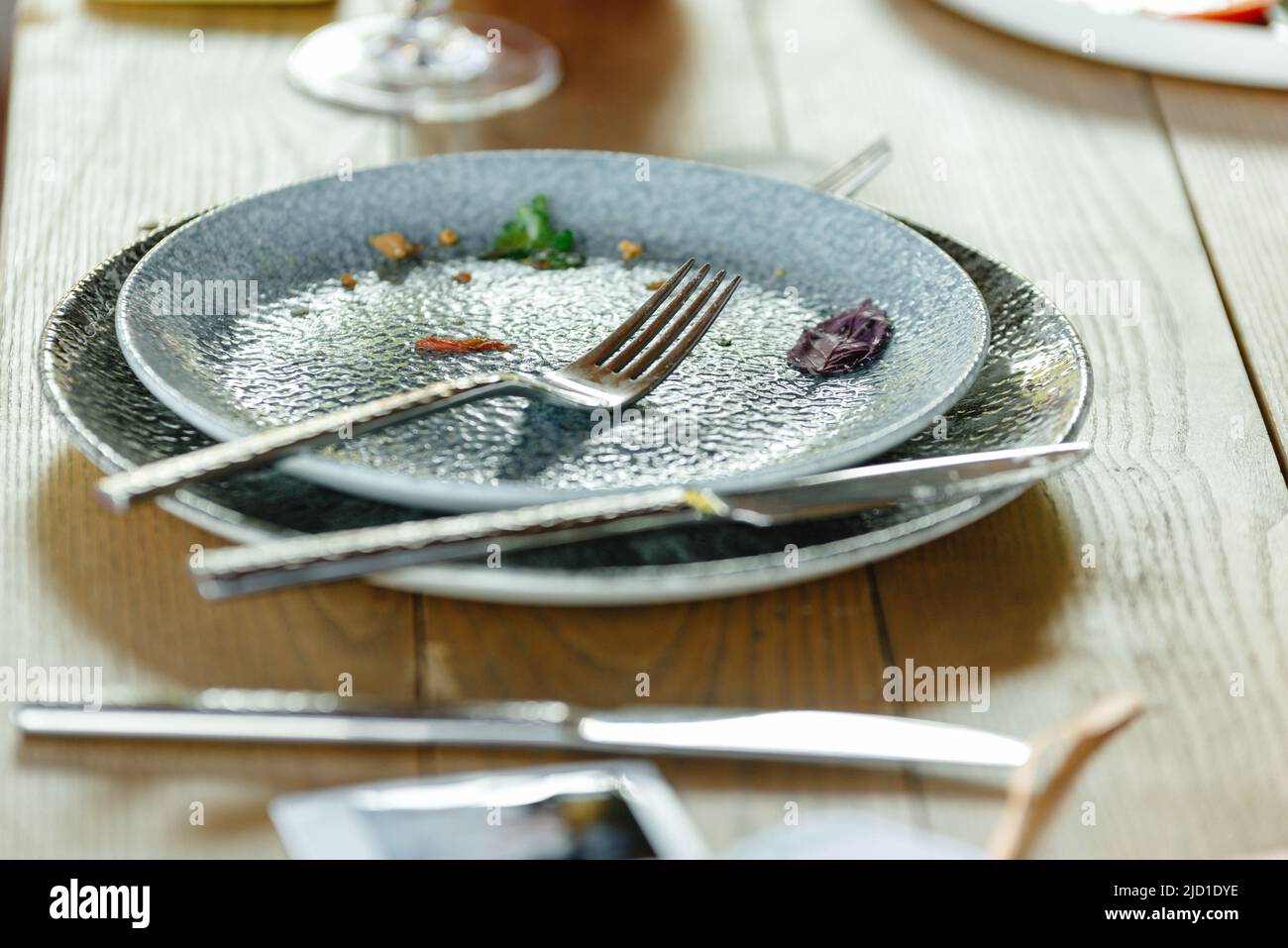 restaurant empty dirty plate. People ate food and left an empty plate