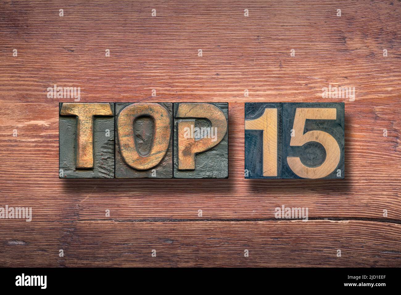 top 15 combined on vintage varnished wooden surface Stock Photo