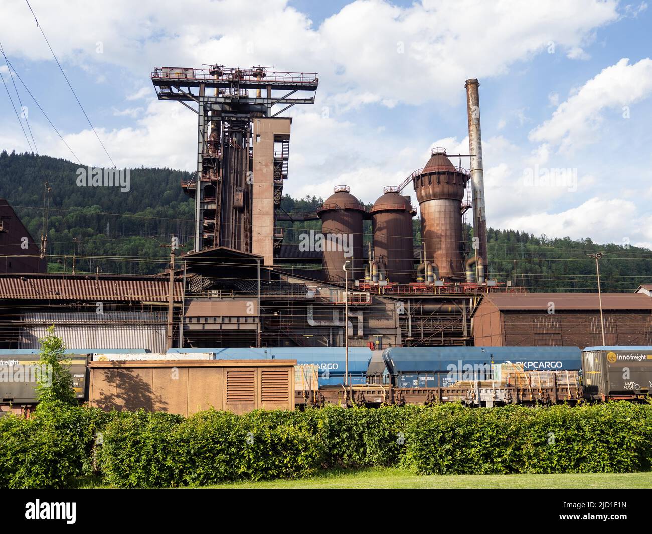 Railway in front of blast furnace, voestalpine steelworks in the Donawitz district, known for the first application of the Linz-Donawitz process for Stock Photo