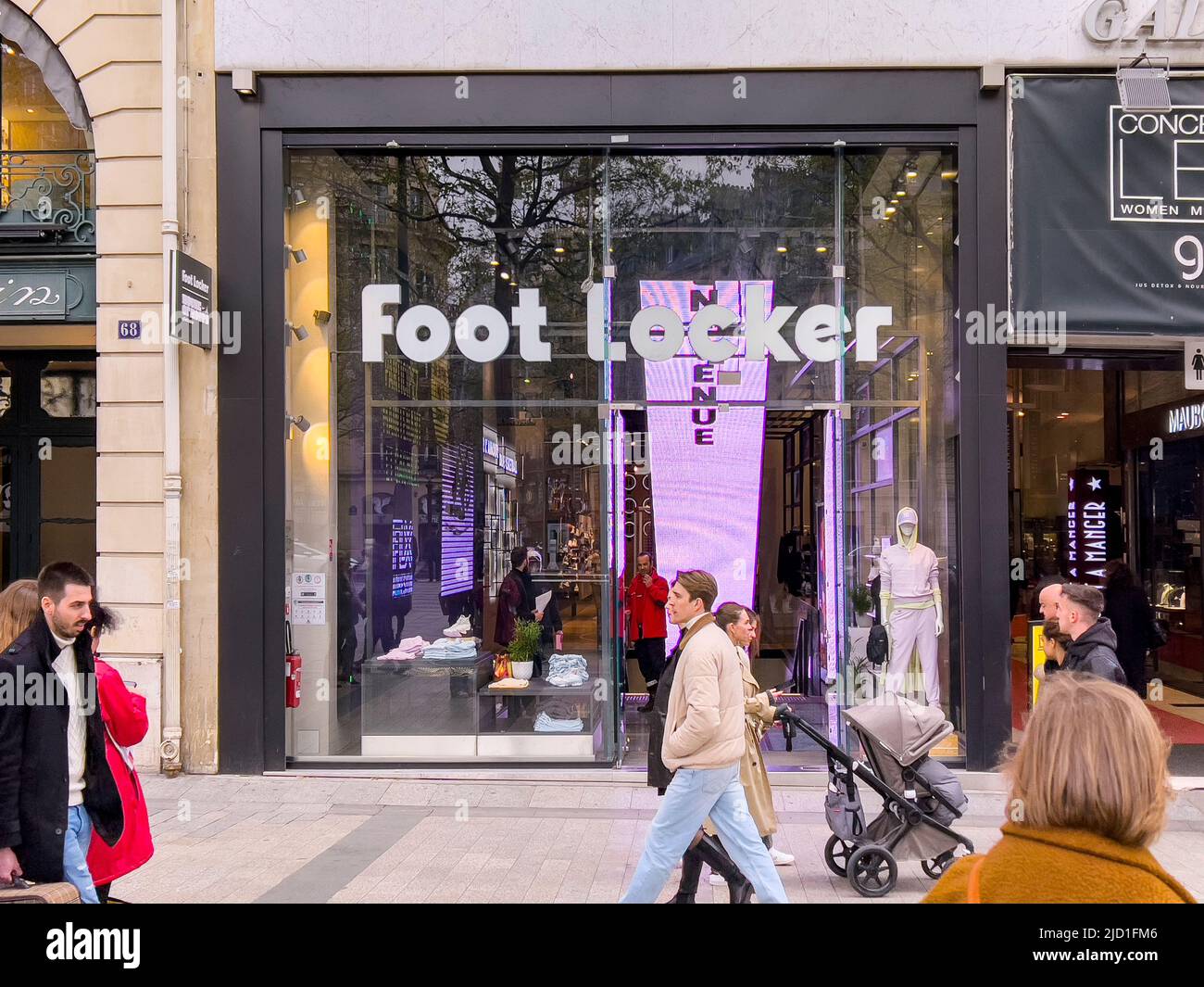 Foot Locker Shop at the Champs Elysees in Paris, France - June 16, 2022:  Pedestrians walking in front of shop exterior. Foot Locker Retail, Inc  Stock Photo - Alamy