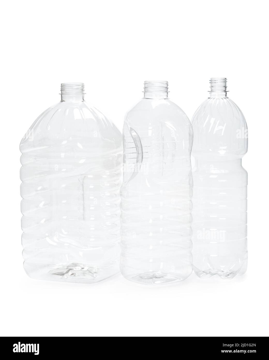 three different empty plastic bottles isolated on white background