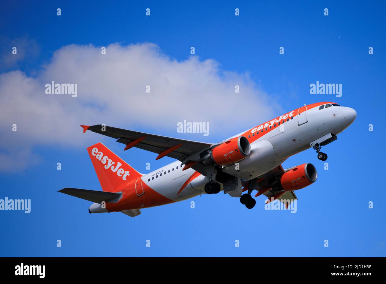 An Easyjet plane takes off on the runway at Gatwick Airport Stock Photo