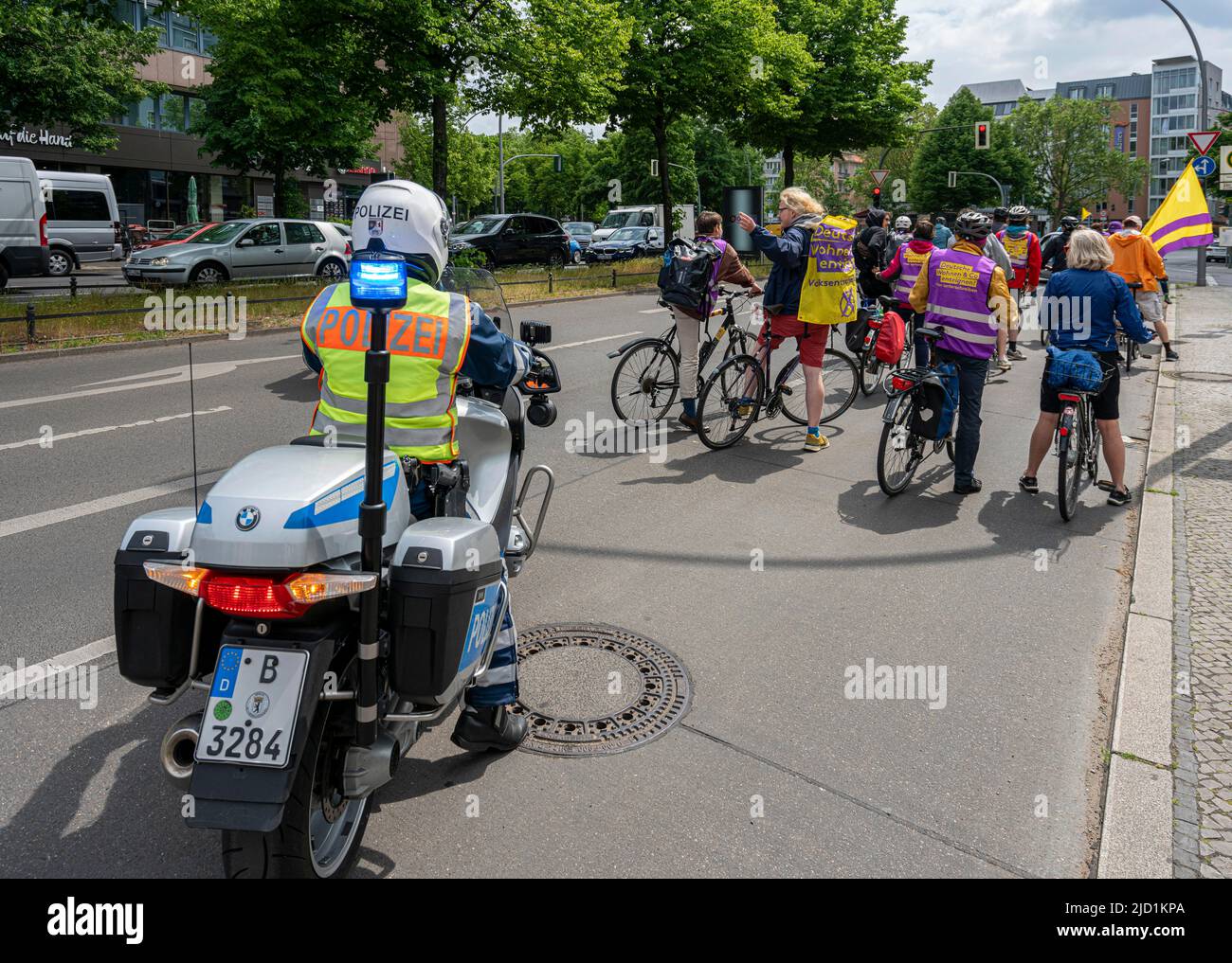 Berlin police escorting a bicycle parade on Kurfuerstendamm, Berlin, Germany Stock Photo