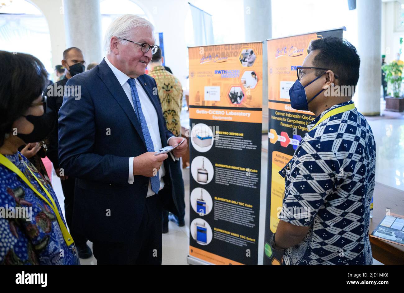 17 June 2022, Indonesia, Yogyakarta: German President Frank-Walter Steinmeier looks at an information booth of a RWTH Aachen University project during a visit to Universitas Gadjah Mada. President Steinmeier is on a two-day visit to Indonesia. He was previously in Singapore for two days. Photo: Bernd von Jutrczenka/dpa Stock Photo