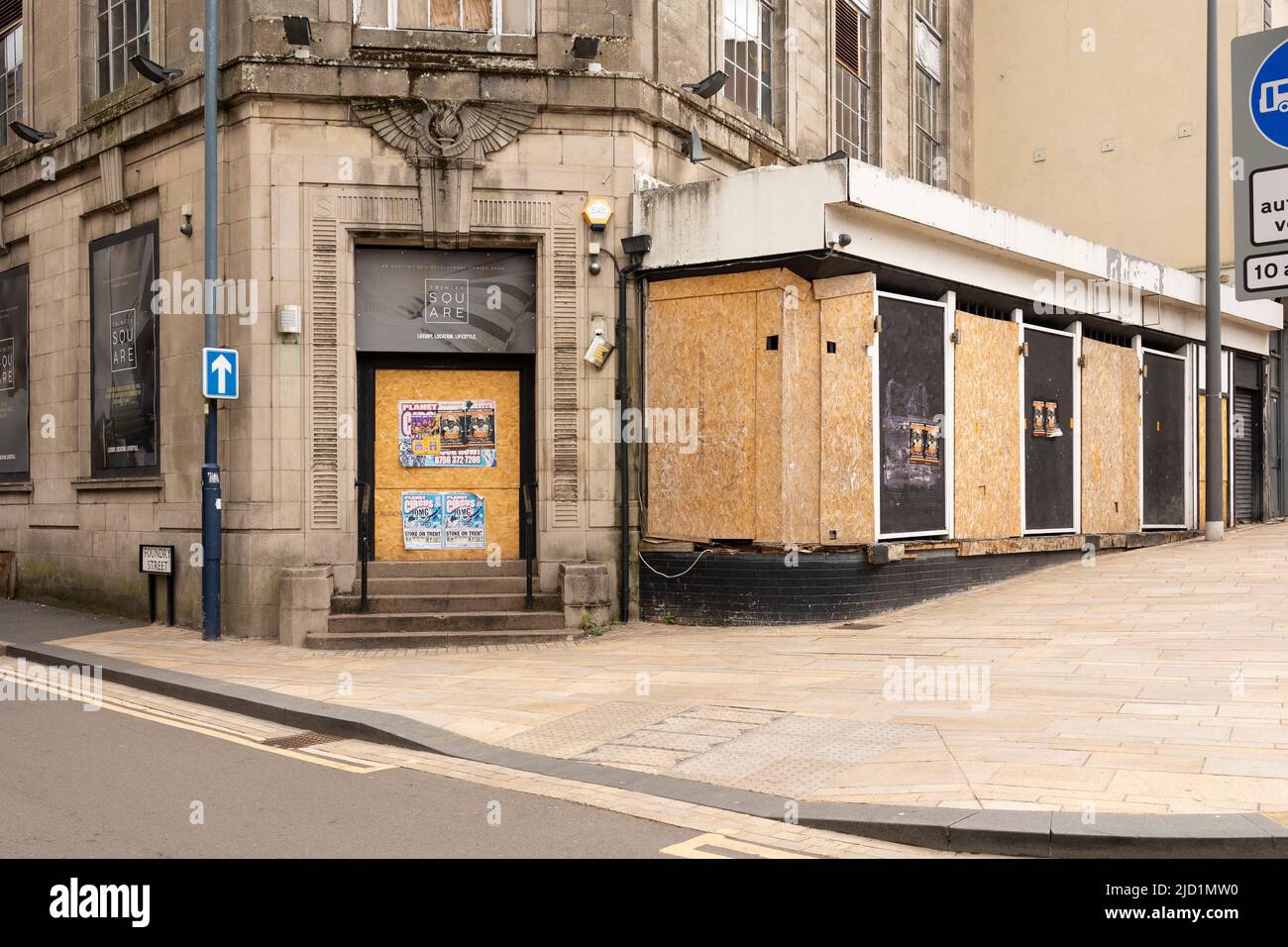 shops and retail premises either boarded up or empty due to economic pressure adding to the city centre ghost town concept Stock Photo