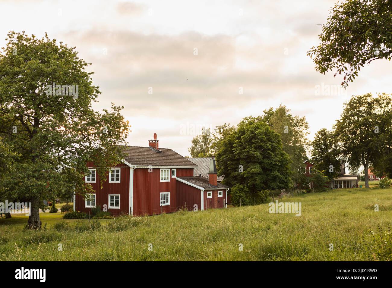 Falun red farm in rural landscape Stock Photo Alamy