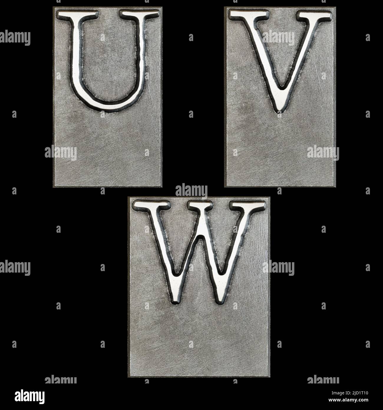3D rendering of metal typewriter print head alphabet - letters U-W Stock Photo