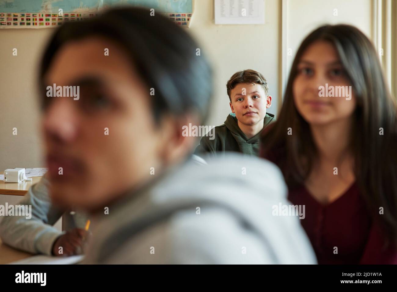 Group of students sitting in class Stock Photo