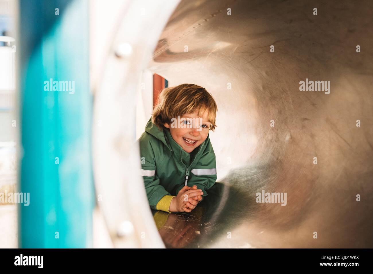 Boy having fun on playground Stock Photo
