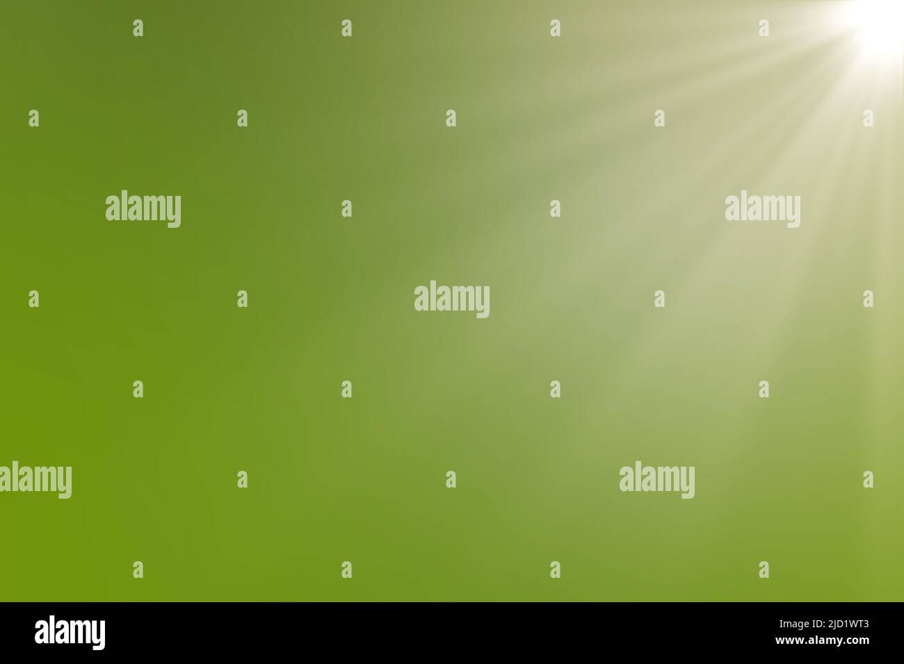 Sunbeams on a blurred green background. Background for design, postcards and copy space Stock Photo