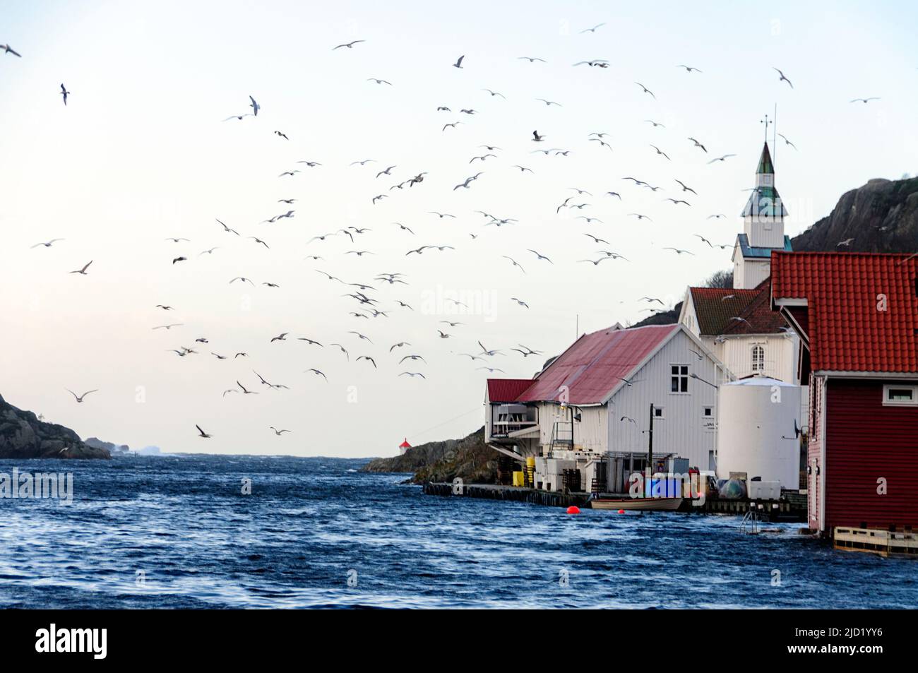 The village of Kirkehamn at the island of Hidra (Agder) in south-western Norway on a stormy winter's day. Stock Photo