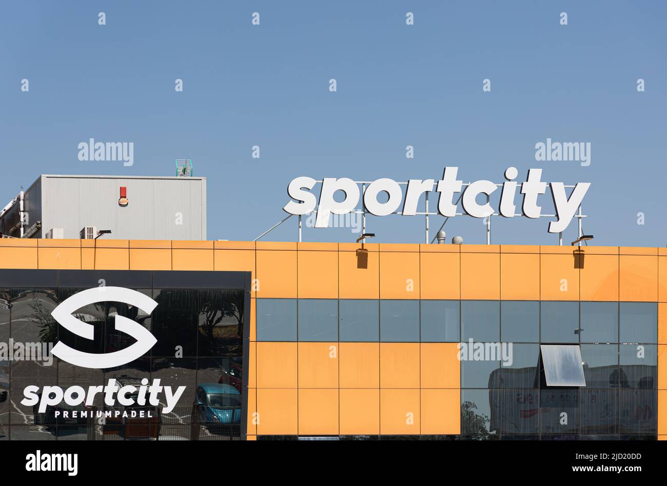 MASSANASSA, SPAIN - JUNE 06, 2022: Sportcity is a sports complex with paddle tennis courts, gym, soccer fields and outdoor training box Stock Photo