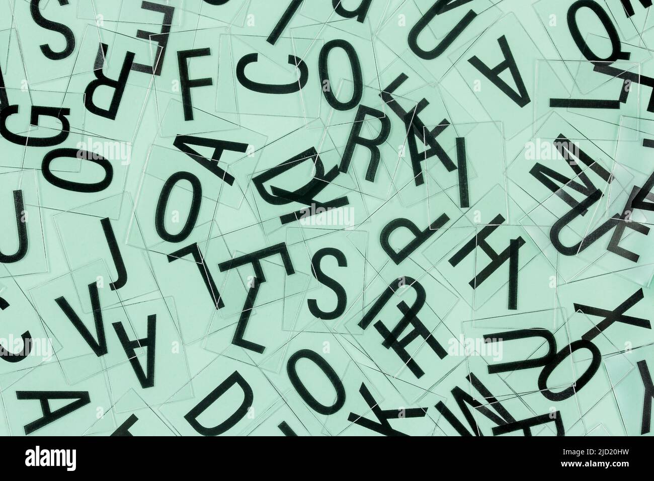 mixed up letters of english alphabet closeup Stock Photo