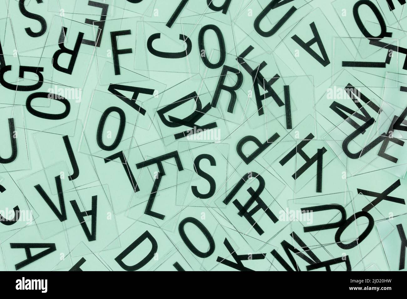 mixed up letters of english alphabet closeup Stock Photo - Alamy