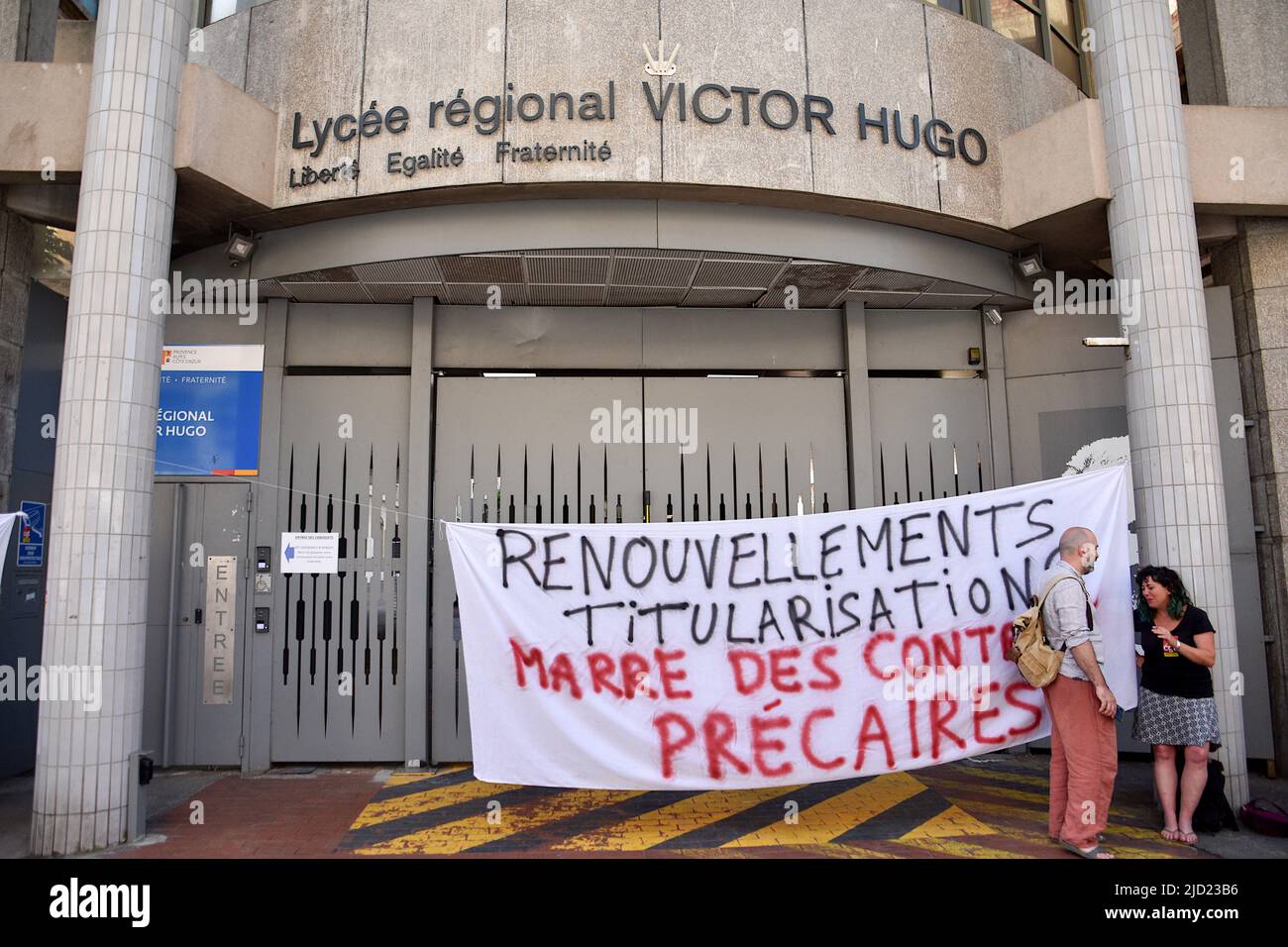 A banner seen hang in front of the entrance to the Lycee Victor-Hugo during the demonstration. The education assistants on strike demonstrated in front of the entrance to the Lycée Victor-Hugo and then in front of the academic inspectorate (DSDEN) to protest against the precariousness of their employment contract. (Photo by Gerard Bottino / SOPA Images/Sipa USA) Stock Photo