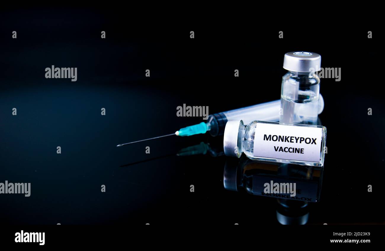 Close up picture of syringe and vials filled with Monkeypox vaccine on ...